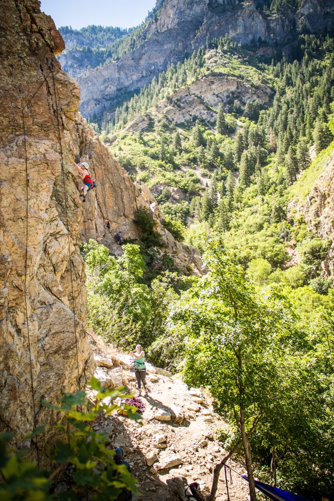 Anna climbing in Rock Canyon in Provo Utah while a friend belays from below.